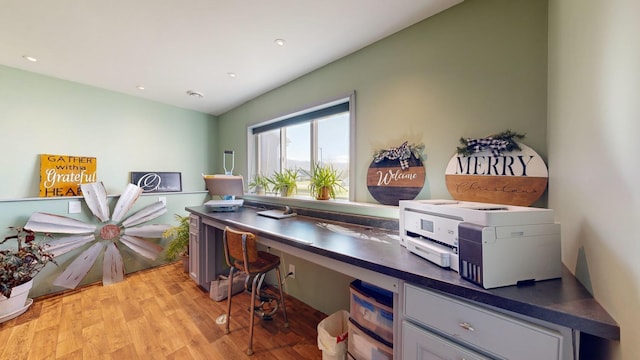 office space with light wood-type flooring