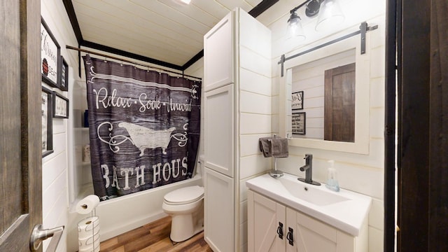 full bathroom with toilet, wood ceiling, hardwood / wood-style floors, vanity, and shower / bathtub combination with curtain