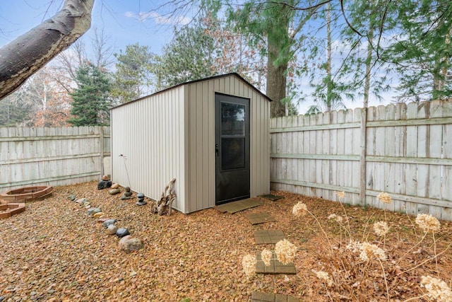 view of shed featuring a fenced backyard