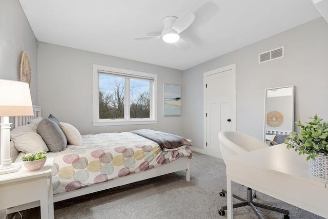 carpeted bedroom featuring ceiling fan