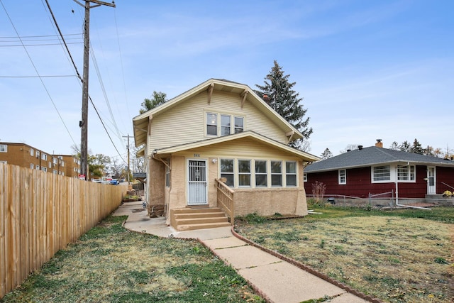 view of front of property with a front lawn