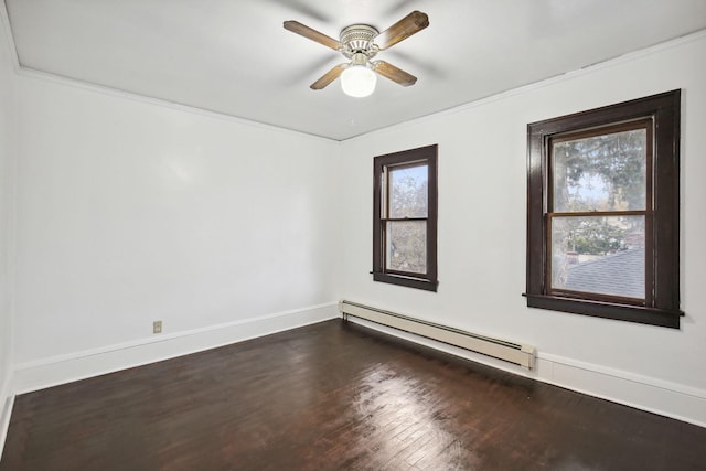 unfurnished room with dark hardwood / wood-style flooring, ornamental molding, baseboard heating, and ceiling fan