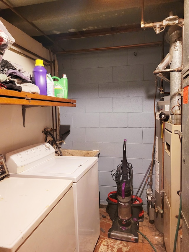 washroom featuring washing machine and dryer