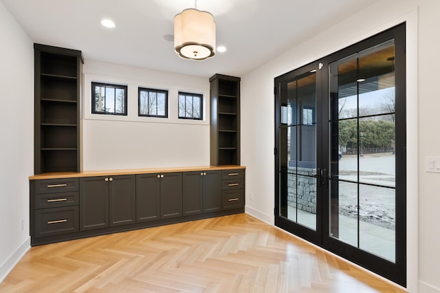 interior space with light parquet flooring