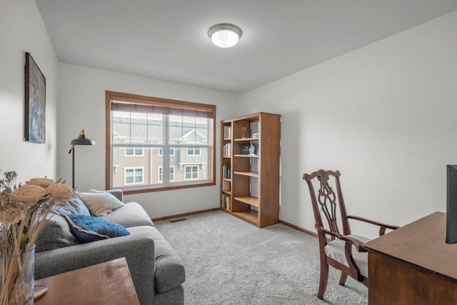 office space with light colored carpet