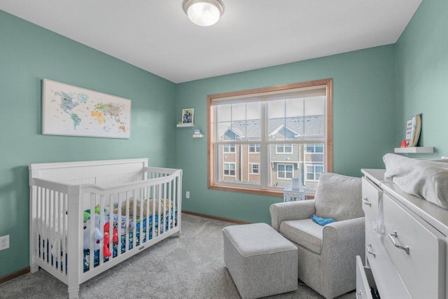 carpeted bedroom with a crib