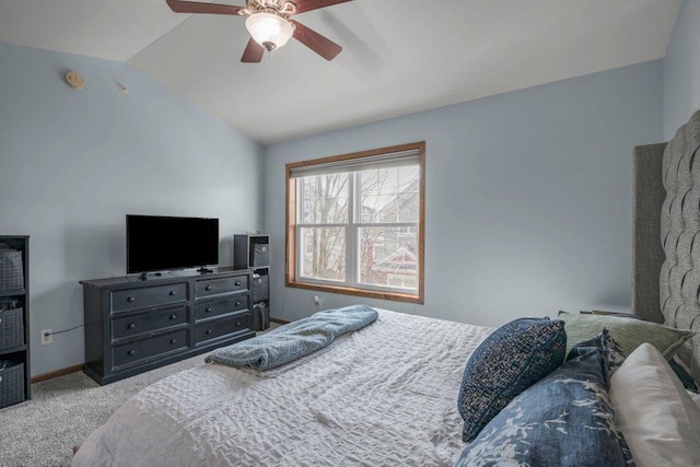 bedroom with ceiling fan, light carpet, and lofted ceiling