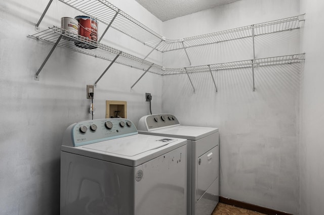 laundry room featuring laundry area and washer and clothes dryer