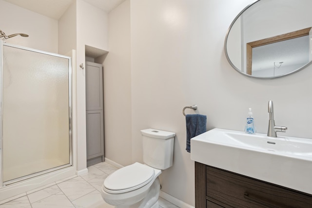 bathroom with vanity, toilet, and walk in shower