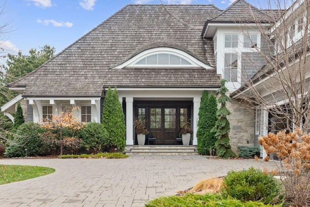 entrance to property featuring french doors