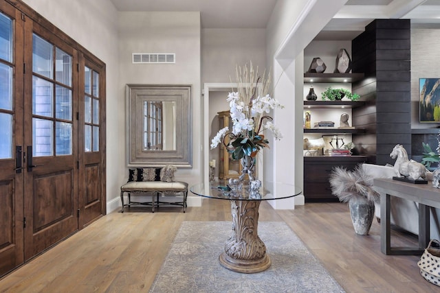 entrance foyer featuring light hardwood / wood-style floors