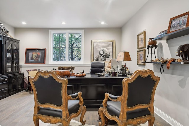 sitting room with light hardwood / wood-style floors