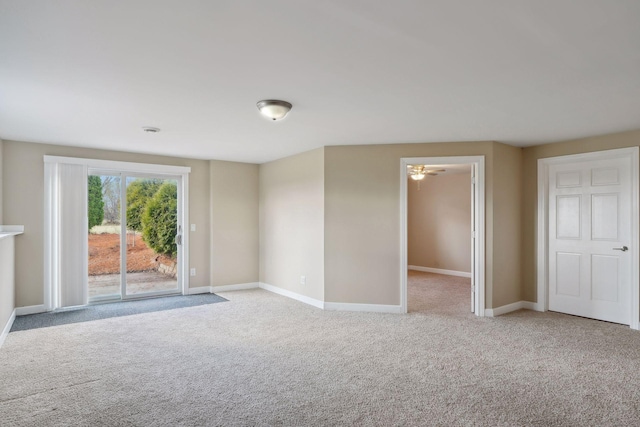 carpeted empty room with ceiling fan