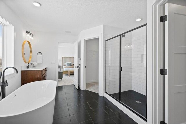 4098 Gable Ln, Woodbury, MN 55129 - full bathroom with a freestanding bath, a stall shower, connected bathroom, and a textured ceiling