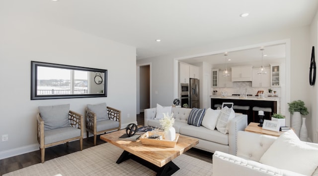 living room with dark wood-type flooring