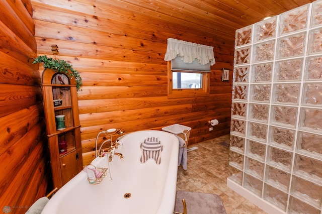 bathroom with wooden ceiling and a bathtub