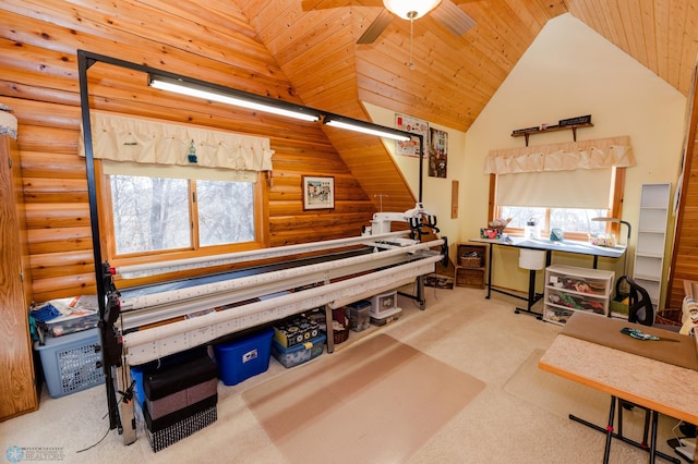 miscellaneous room featuring wooden ceiling, rustic walls, high vaulted ceiling, and ceiling fan