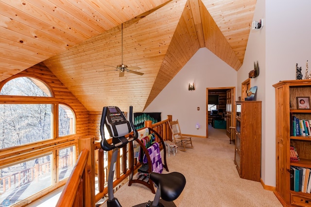 exercise room with light colored carpet, lofted ceiling, ceiling fan, and wood ceiling