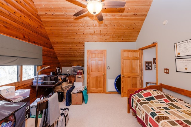 carpeted bedroom featuring lofted ceiling, ceiling fan, and wooden ceiling