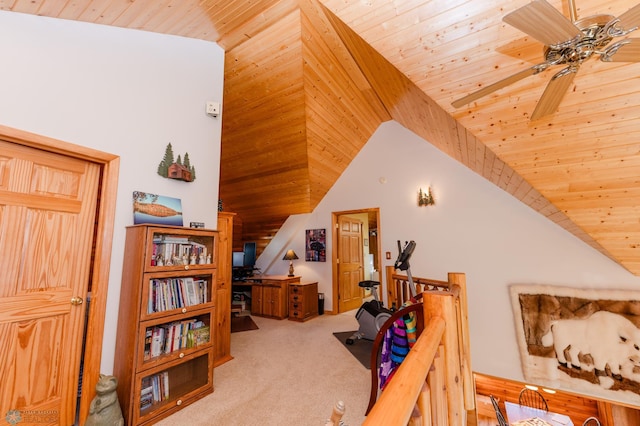 interior space with high vaulted ceiling, light carpet, and wooden ceiling