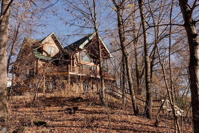 exterior space featuring a wooden deck