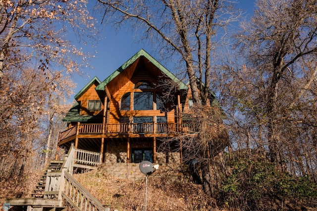 view of front of house with a wooden deck