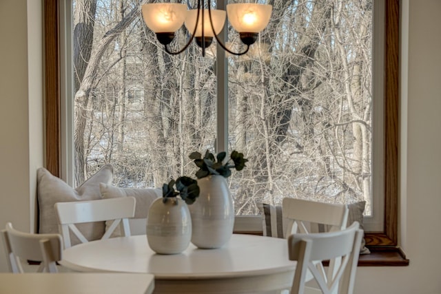 dining area with a notable chandelier