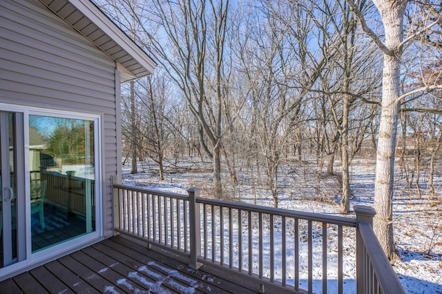 view of snow covered deck