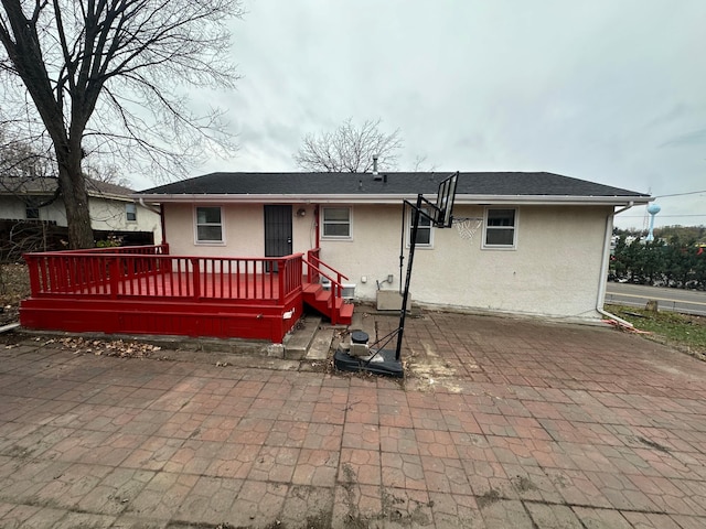 view of front of home featuring a patio and a deck