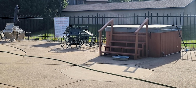 view of patio featuring a hot tub