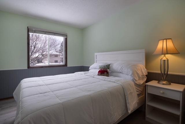 bedroom featuring wood-type flooring