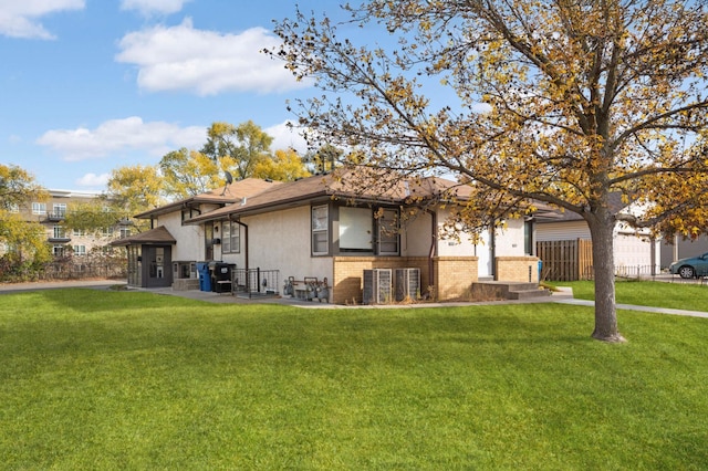 view of front of home with a front yard