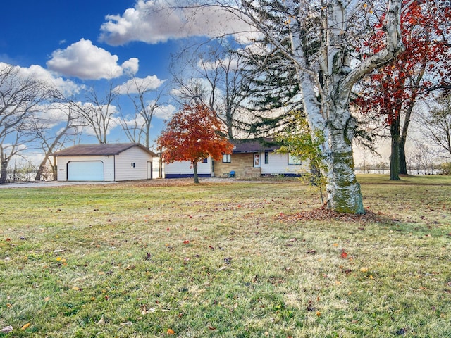 view of yard with a garage