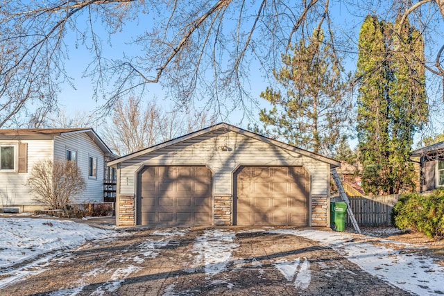 view of snow covered garage