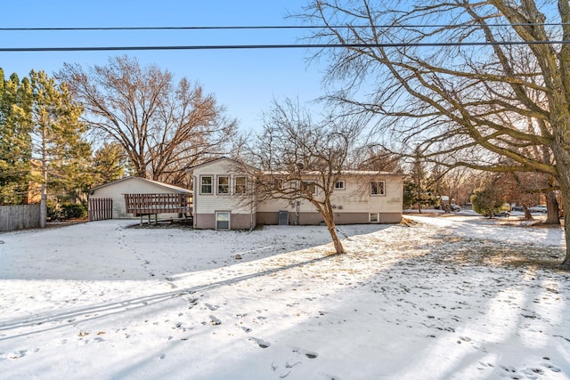 view of snow covered house