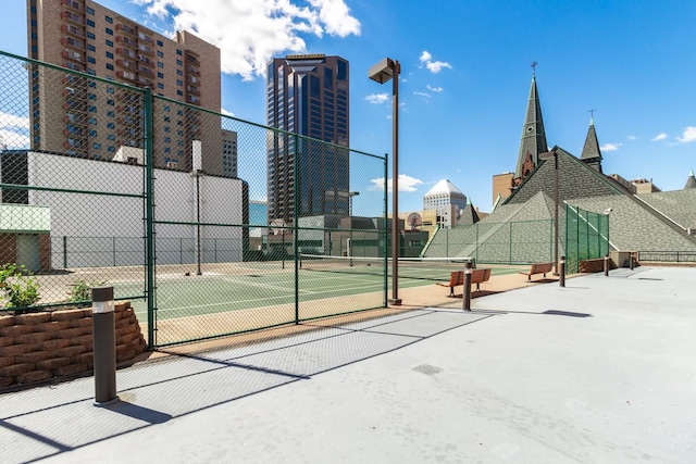 exterior space with tennis court