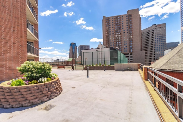 view of patio featuring a balcony