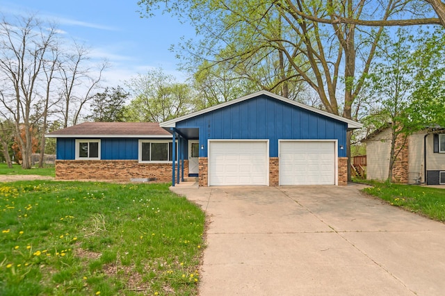 single story home with a front yard and a garage