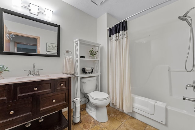 full bathroom featuring vanity, shower / bath combo with shower curtain, a textured ceiling, and toilet