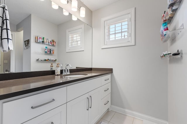 bathroom featuring tile patterned floors and vanity