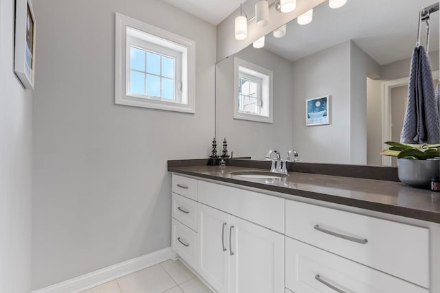 bathroom with vanity and tile patterned flooring