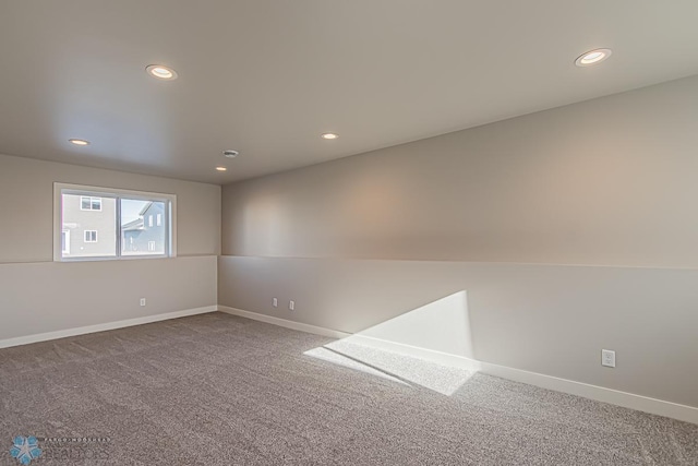 empty room featuring carpet flooring