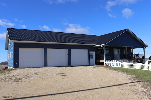 single story home featuring a garage