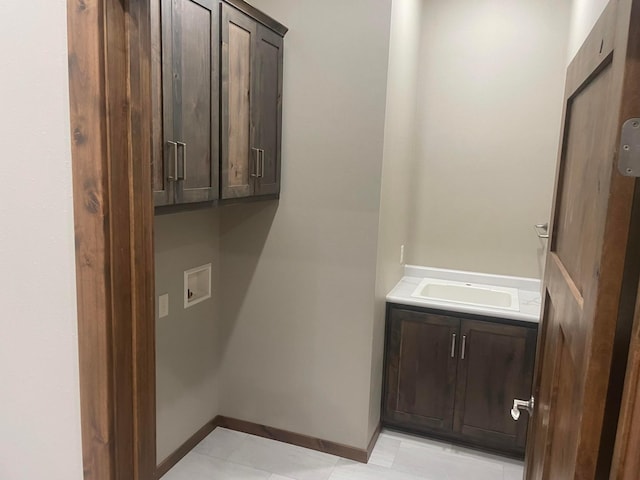 bathroom featuring vanity and tile patterned flooring