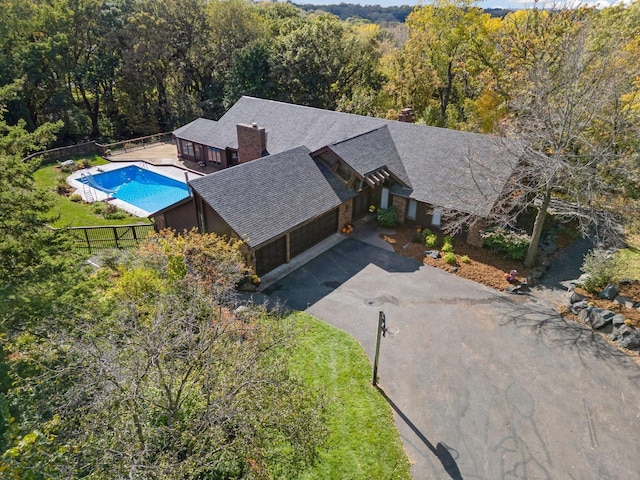 6517 Crackleberry Trl, Woodbury, MN 55129 - view of subject property with a pool and a forest