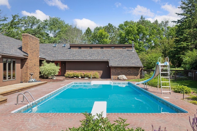 6517 Crackleberry Trl, Woodbury, MN 55129 - view of pool with a diving board, a water slide, and a patio