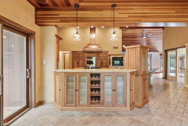 6517 Crackleberry Trl, Woodbury, MN 55129 - kitchen featuring wooden ceiling, a high ceiling, glass insert cabinets, a ceiling fan, and light stone finish floors