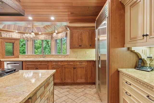 6517 Crackleberry Trl, Woodbury, MN 55129 - kitchen featuring appliances with stainless steel finishes, light stone counters, a chandelier, and wooden ceiling