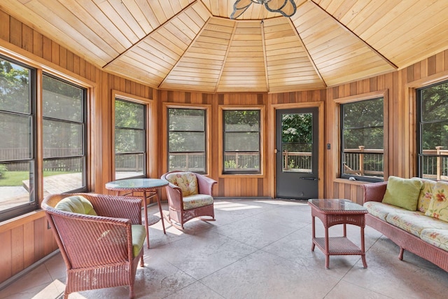 6517 Crackleberry Trl, Woodbury, MN 55129 - sunroom with an outdoor hangout area, lofted ceiling, wooden walls, and wooden ceiling
