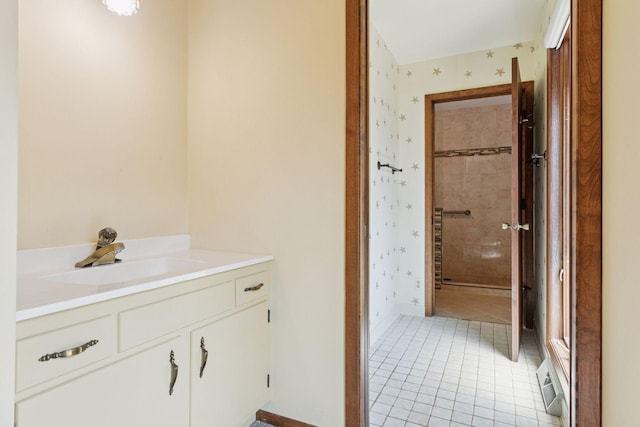 6517 Crackleberry Trl, Woodbury, MN 55129 - bathroom with vanity, tile patterned flooring, and wallpapered walls